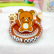 Load image into Gallery viewer, adult deco pacifier paci shop custom decorated binky for age regression store agere ddlg dd lg daddy dom little girl abdl baby diaper lover kawaii littlespace little space rhinestone deluxe kawaii rilakkuma brown bear sanrio paws 
