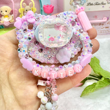 Load image into Gallery viewer, Hello Kitty Angel Shaker Adult Pacifier with Handle Charm

